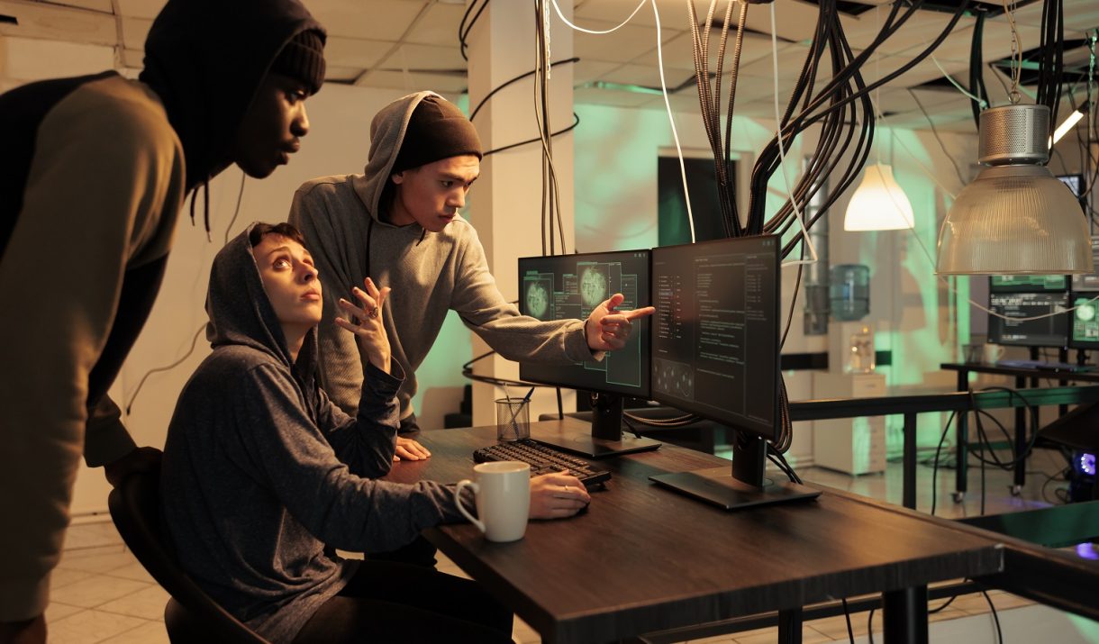 internet technology security specialists team fixing computer system cyberattack