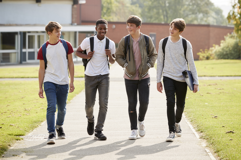group of male teenage students walking around coll pm9wfq5.jpg
